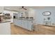 Spacious kitchen with large island, stainless steel appliances, and hardwood floors at 3649 Pinehill Cir, Acworth, GA 30101