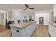Modern kitchen with granite island and stainless steel appliances at 3649 Pinehill Cir, Acworth, GA 30101
