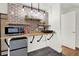 Small kitchenette with microwave and mini-fridge at 3649 Pinehill Cir, Acworth, GA 30101