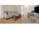 Living room with hardwood floors, neutral colors, and comfortable furniture at 3649 Pinehill Cir, Acworth, GA 30101