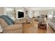 Living room featuring hardwood floors, comfortable seating and large windows at 3649 Pinehill Cir, Acworth, GA 30101