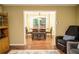 Dining room with hardwood floors and access to deck at 4770 Quail Hunt Ct, Powder Springs, GA 30127