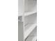 Bright white walk-in closet with multiple shelves and a clothes rod at 382 Northdale Ct, Lawrenceville, GA 30046