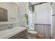 Simple bathroom with a single vanity, toilet, and shower/tub combo at 453 Mary Sw St, Atlanta, GA 30310