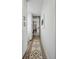 Bright hallway with a patterned rug and built-in storage at 453 Mary Sw St, Atlanta, GA 30310