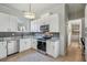 Modern kitchen with white cabinets and granite counters at 453 Mary Sw St, Atlanta, GA 30310