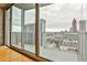 Balcony with city views and floor to ceiling sliding doors at 860 Peachtree Ne St # 2506, Atlanta, GA 30308