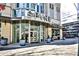 Spire building entrance with modern design and landscaping at 860 Peachtree Ne St # 2506, Atlanta, GA 30308