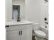Bathroom featuring white cabinets, and a toilet with a tub at 261 Martin Spring Rd, Lawrenceville, GA 30045