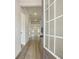 Inviting entryway hallway with hardwood floors leading to a bright living space at 261 Martin Spring Rd, Lawrenceville, GA 30045