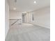 Loft area with neutral walls and soft carpeting at 261 Martin Spring Rd, Lawrenceville, GA 30045