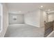 Loft area with neutral walls and soft carpeting at 261 Martin Spring Rd, Lawrenceville, GA 30045