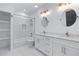 Spa-like bathroom with double vanity, marble shower, and soaking tub at 883 Gaston Sw St, Atlanta, GA 30310