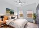 Second bedroom with light wood furniture and a large window at 883 Gaston Sw St, Atlanta, GA 30310