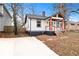 Front exterior featuring a well-maintained lawn and charming craftsman architecture with a new driveway at 883 Gaston Sw St, Atlanta, GA 30310