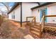 Back exterior of house with wooden deck and stairs at 883 Gaston Sw St, Atlanta, GA 30310