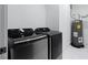 Laundry room with Samsung washer and dryer and water heater at 883 Gaston Sw St, Atlanta, GA 30310
