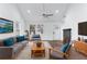 Bright living room featuring hardwood floors and a fireplace at 883 Gaston Sw St, Atlanta, GA 30310