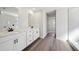 Bathroom with double vanity, modern fixtures, and shower with glass door at 281 Martin Spring Rd, Lawrenceville, GA 30045