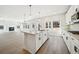 Open floor plan with a modern kitchen that features a center island and stainless appliances at 281 Martin Spring Rd, Lawrenceville, GA 30045