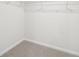 Spacious walk-in closet offering ample storage with wire shelving at 711 Lily Blossom Path, Lawrenceville, GA 30045