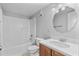 Updated bathroom with a tub and wood vanity at 32 Peachtree Nw St # 804, Atlanta, GA 30303