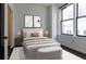 Main bedroom with large windows and city views at 32 Peachtree Nw St # 804, Atlanta, GA 30303