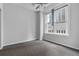 Bedroom with hardwood floors and large windows at 32 Peachtree Nw St # 804, Atlanta, GA 30303