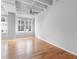 Spacious living room with hardwood floors and large windows at 32 Peachtree Nw St # 804, Atlanta, GA 30303