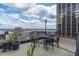 Rooftop deck offering stunning city views and seating area at 32 Peachtree Nw St # 804, Atlanta, GA 30303
