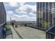 Rooftop deck with cityscape views and comfortable seating at 32 Peachtree Nw St # 804, Atlanta, GA 30303