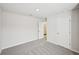Spacious bedroom with neutral paint, plush carpet, and ample natural light at 602 Wallace Oak Ln, Lawrenceville, GA 30045