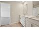 Bright bathroom featuring double vanity, modern fixtures, and neutral walls and floors at 1260 Firefly Field Trce Trce, Lawrenceville, GA 30045