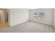 Bedroom featuring neutral carpet, natural light, and an ensuite bathroom, creating a tranquil retreat at 1260 Firefly Field Trce Trce, Lawrenceville, GA 30045