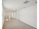 Upstairs hallway features plush carpet, neutral paint, and natural lighting at 1260 Firefly Field Trce Trce, Lawrenceville, GA 30045