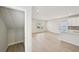 Spacious living area connecting to the kitchen and featuring ample storage at 1260 Firefly Field Trce Trce, Lawrenceville, GA 30045