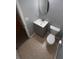 Simple bathroom with gray vanity and tile floor at 142 Benfield Cir, Cartersville, GA 30121