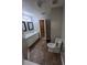 Bathroom with double vanity, tiled floor and toilet at 142 Benfield Cir, Cartersville, GA 30121