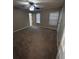 Spacious carpeted bedroom with ceiling fan at 142 Benfield Cir, Cartersville, GA 30121