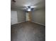 Large bedroom with ceiling fan and neutral carpeting at 142 Benfield Cir, Cartersville, GA 30121
