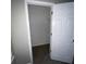 Standard-sized closet with a hanging rod and carpeted floor at 142 Benfield Cir, Cartersville, GA 30121