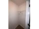 Well-lit closet with wire shelving and room for clothes at 142 Benfield Cir, Cartersville, GA 30121