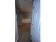 A hallway with carpeted floors and neutral-colored walls at 142 Benfield Cir, Cartersville, GA 30121