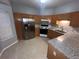 Kitchen with stainless steel appliances and granite countertops at 142 Benfield Cir, Cartersville, GA 30121