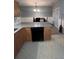 Open kitchen with granite countertops and island at 142 Benfield Cir, Cartersville, GA 30121