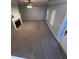 Living room with fireplace and neutral carpeting at 142 Benfield Cir, Cartersville, GA 30121