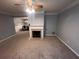 Living room with fireplace and carpet at 142 Benfield Cir, Cartersville, GA 30121