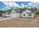 Two story home with attached garage and nice curb appeal at 180 Eryn Ter, Covington, GA 30014