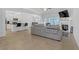 Open concept living room with kitchen and hardwood floors at 180 Eryn Ter, Covington, GA 30014