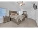 Main bedroom with plush carpet and a ceiling fan at 180 Eryn Ter, Covington, GA 30014